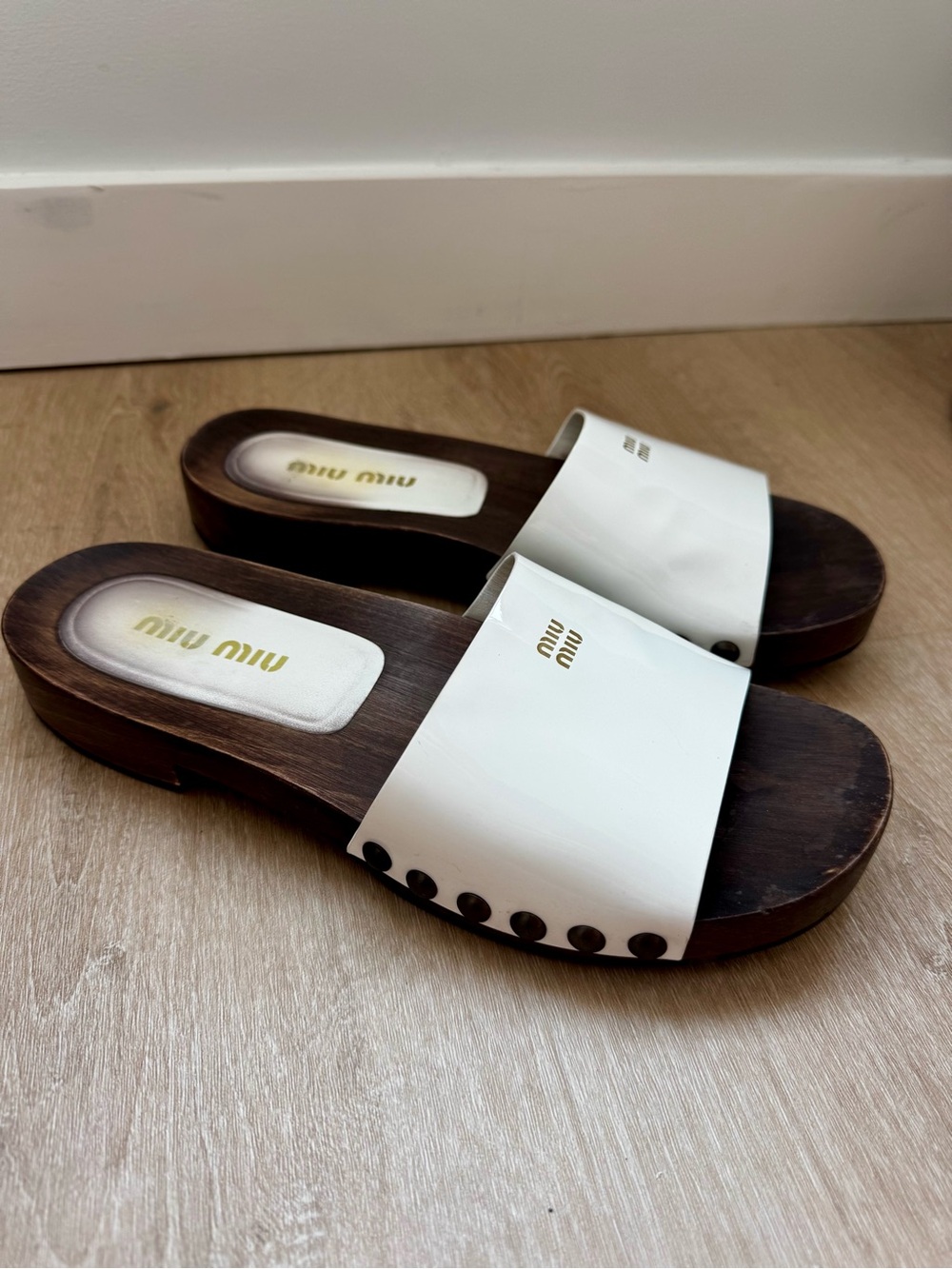 Miu Miu white patent leather clog sandals